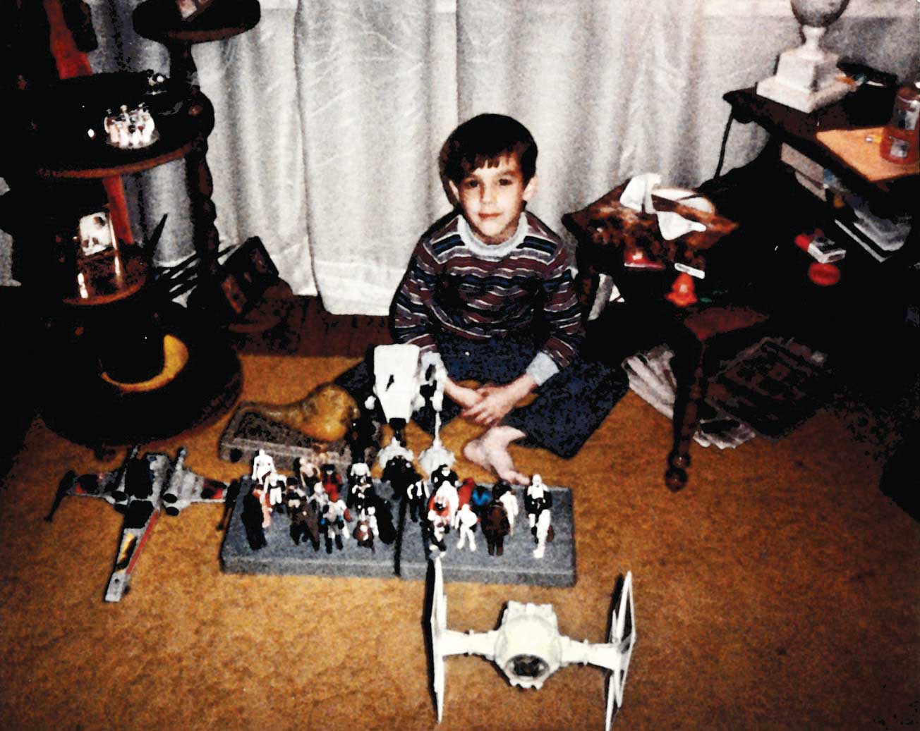 Writer Jayson Peters poses with a small sample of his 'Star Wars' toy collection circa 1983.
