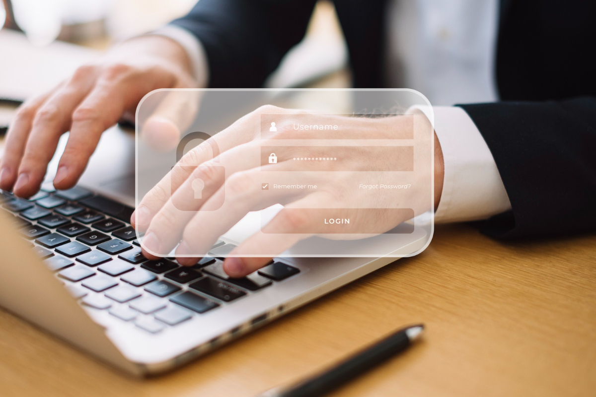 Senha: Segurança de site Montagem com usuário e senha sobre mão de homem digitando algo em notebook