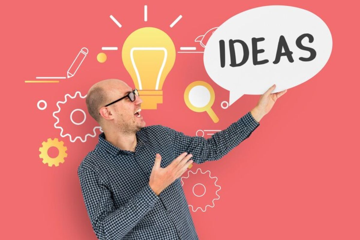 ideas: posts geniais homem feliz, apontando para uma ilustração de balão com o nome ideias