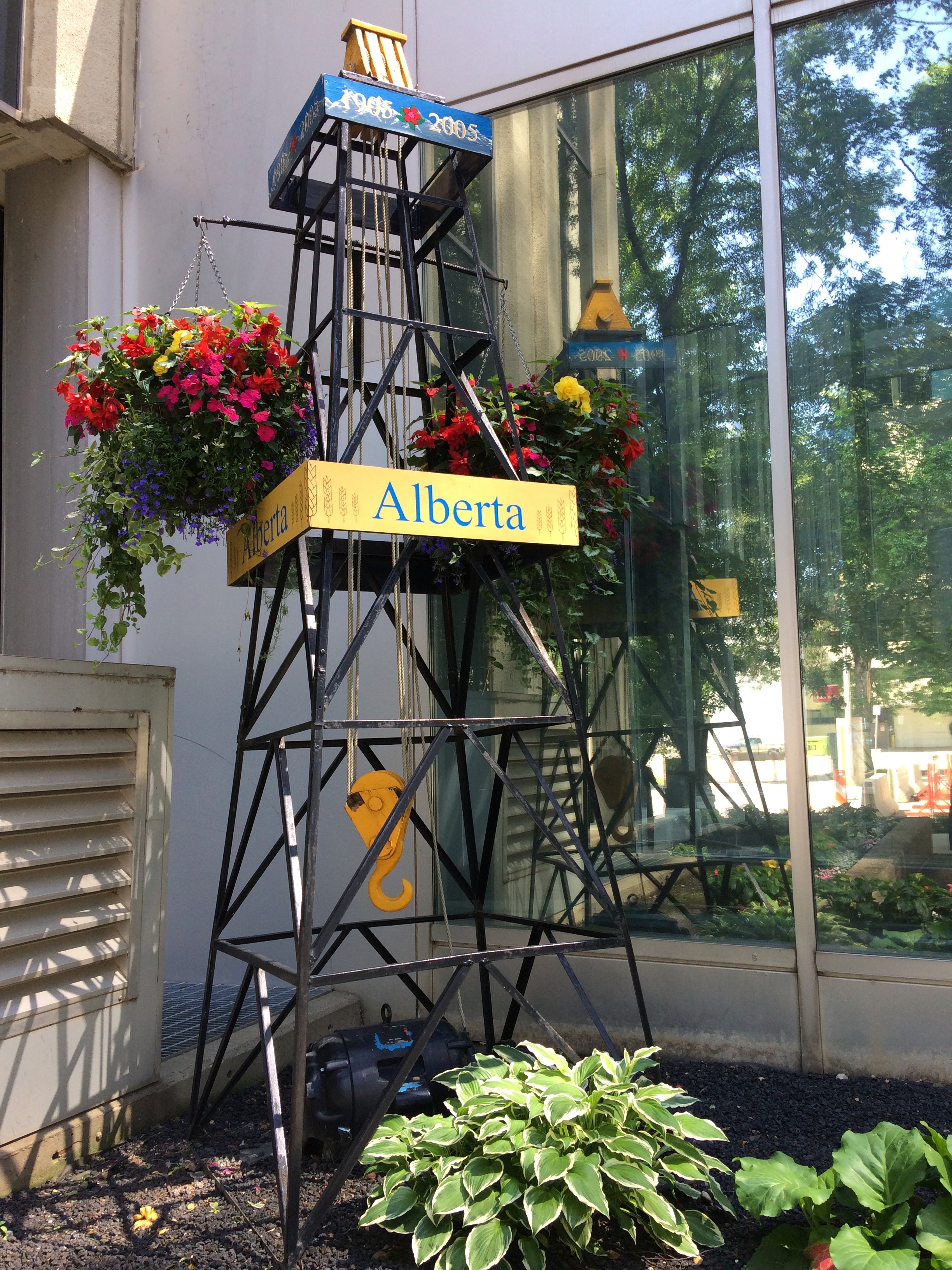 miniature oil rig with Alberta provincial logo