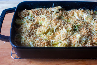 add cheese and buttered crumbs, bake some more
