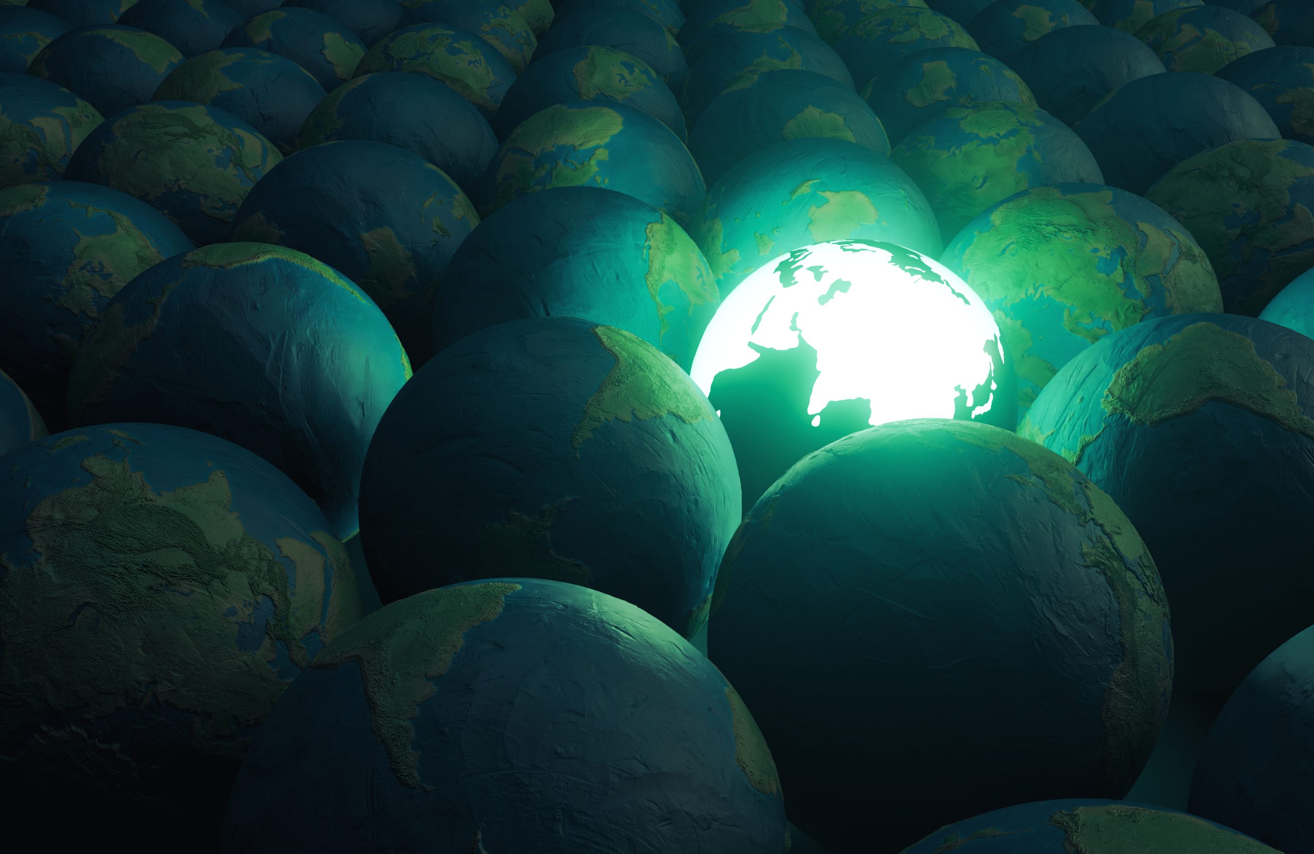 A 3D render of an illuminated neon florescent earth globe among a collection of dull earth globes made of rough clay