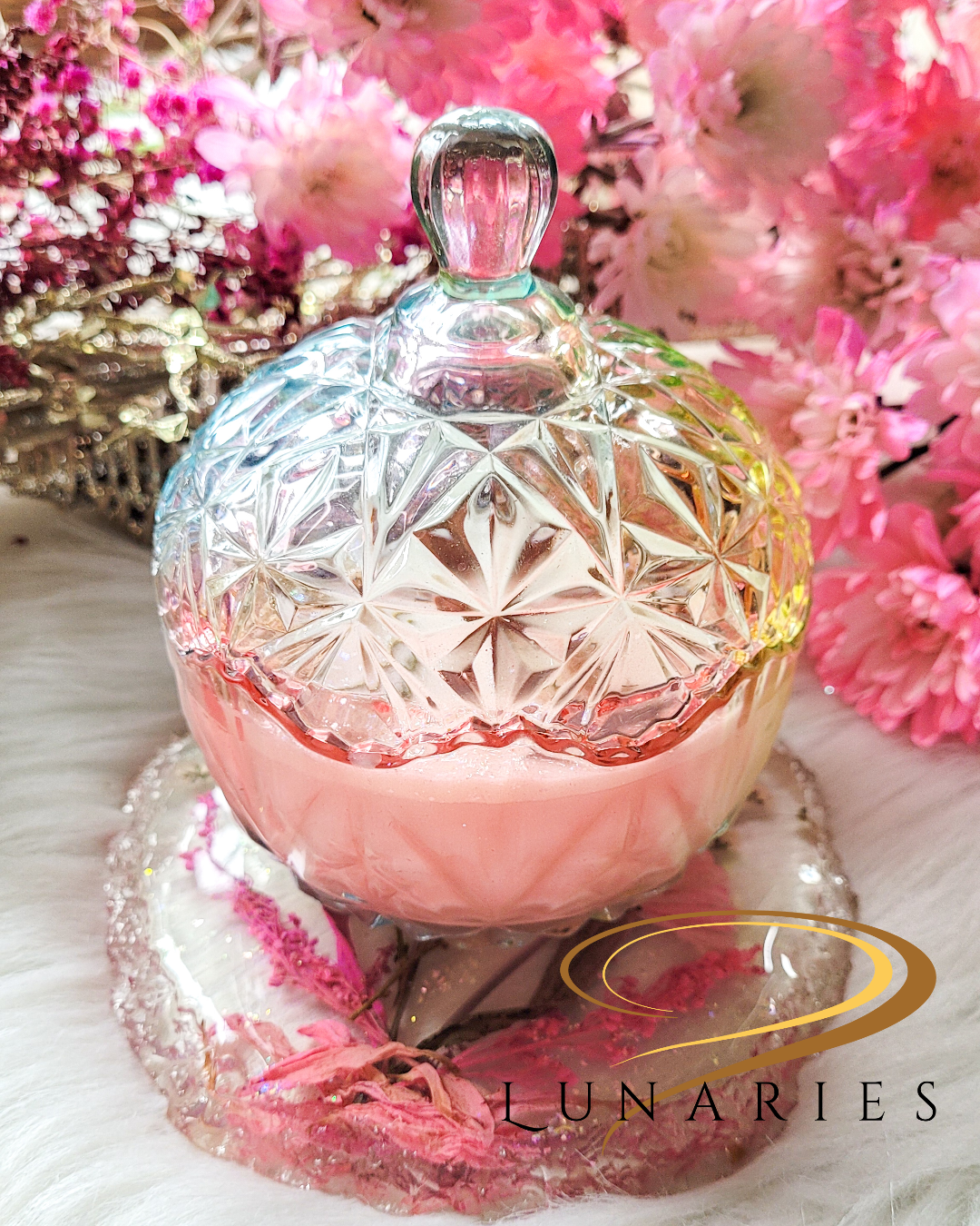 soy wax candle in a crystal-like glass jar with a lid in rainbow colors