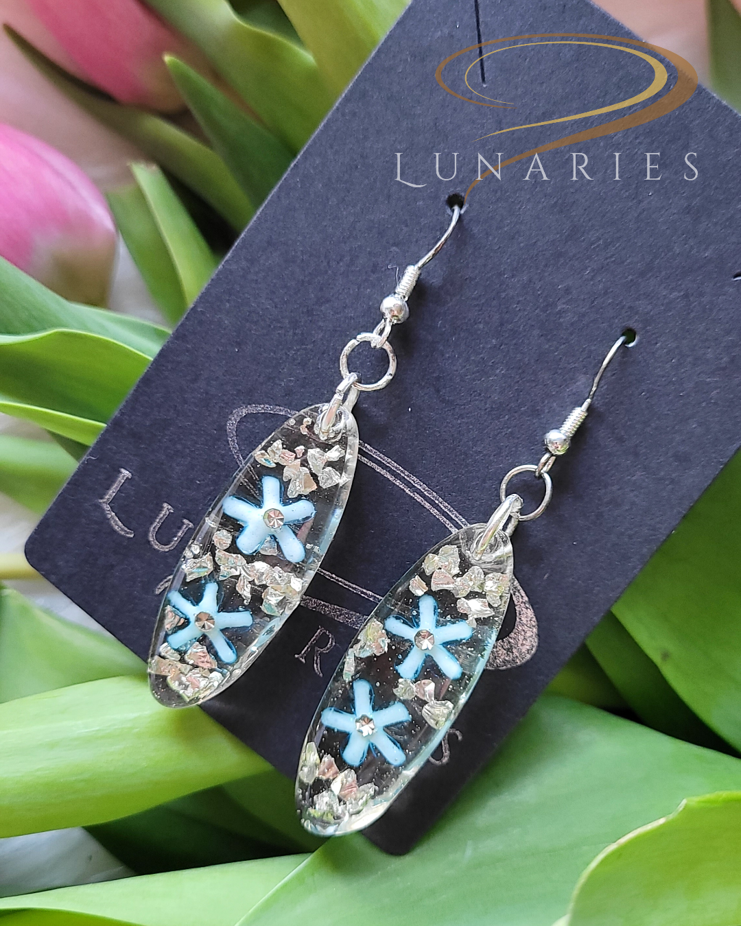 clear resin earrings with blue resin flowers with silver rhinestones
