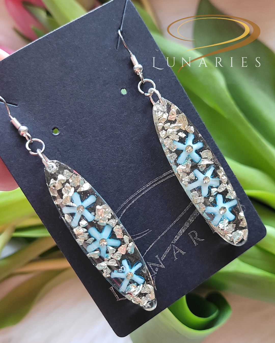 Oval Clear Resin Earrings with Blue Flowers - Image 3
