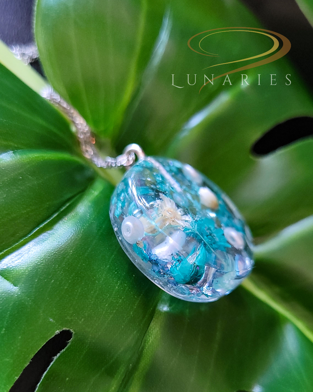 Clear Botanical Resin Necklace with Real Teal Dried Flowers - Image 2