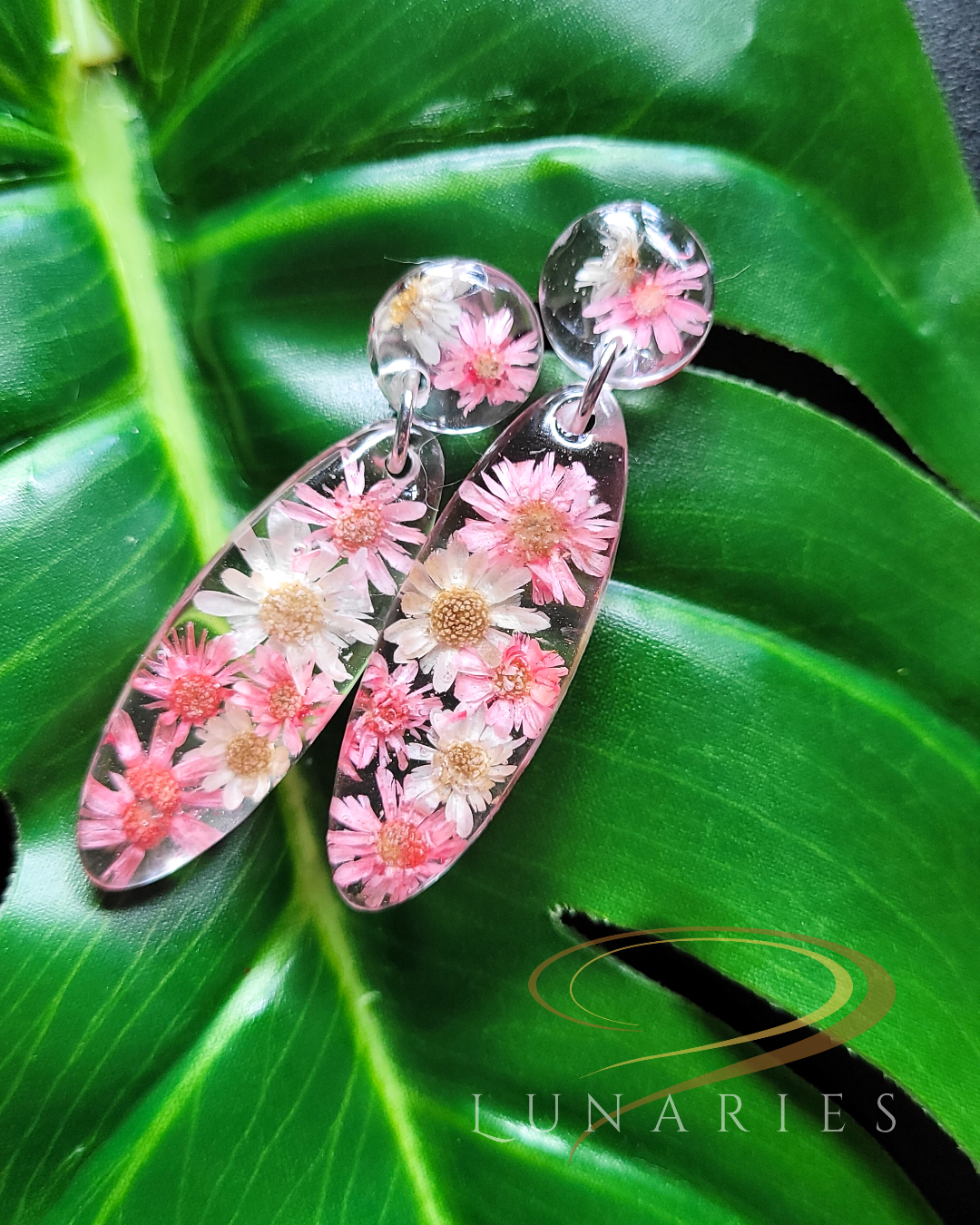 Oval resin earrings with real dried pink and white flowers