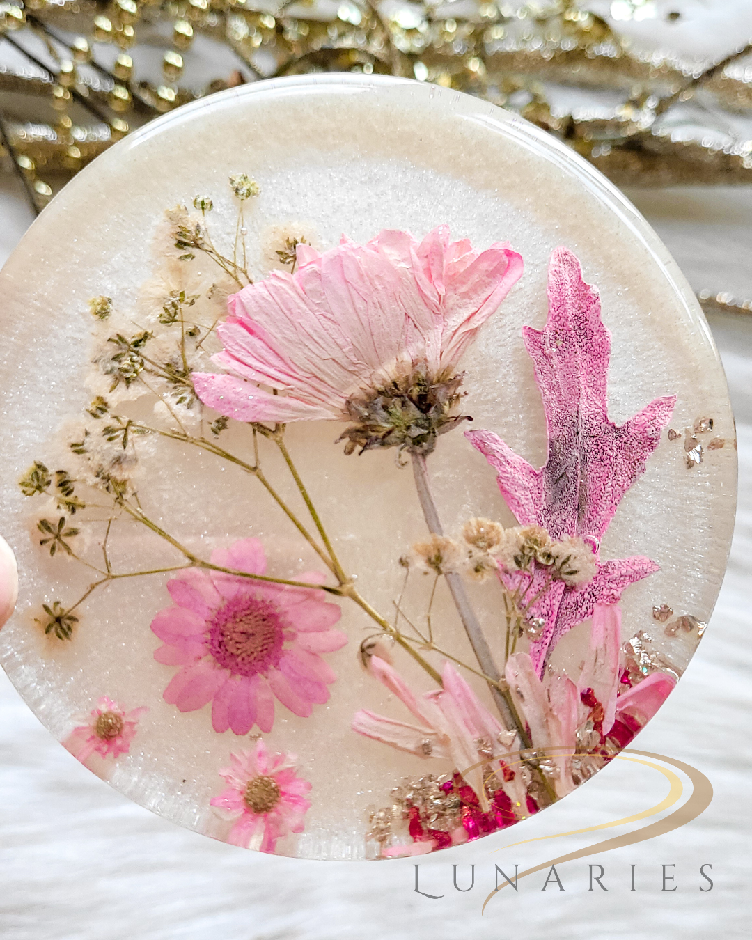 pearl white resin coaster with pink pressed flowers in clear finish