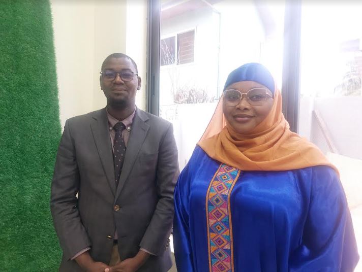 Mohamane (in suit) and Aminatou at the MFWA office in Accra, Ghana, during the DPI fellowship.