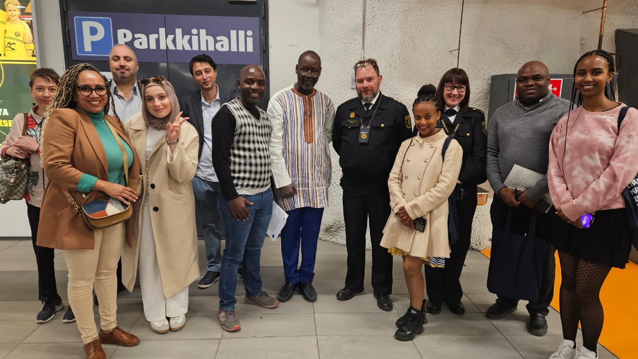 A group of journalists, including the author (in grey cardigan) with Helsinki Rescue Rescue Department officials, Mr Tomi Rask and Ms Järvenkylä, at Merihaka Civil Defence Shelter, Helsinki