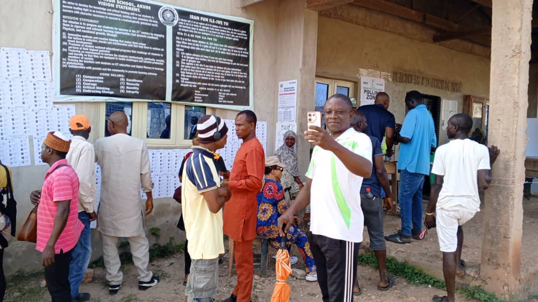 Voters queuing to vote