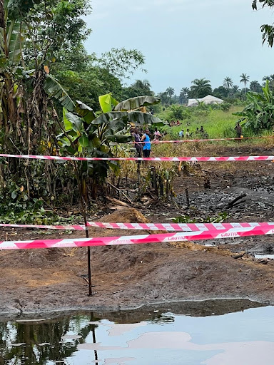 Ruptured Trans Niger Delta pipeline spilling crude oil