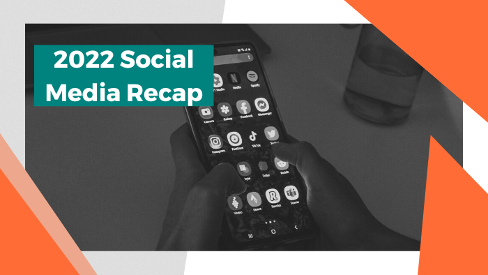 2022 Social Media Recap - Photo of a person holding a smartphone displaying social media app icons