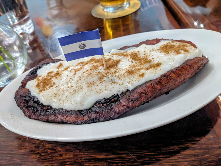 Canoas: A baked plantain topped with rice pudding and cinnamon. At Sarita's Grill and Beer