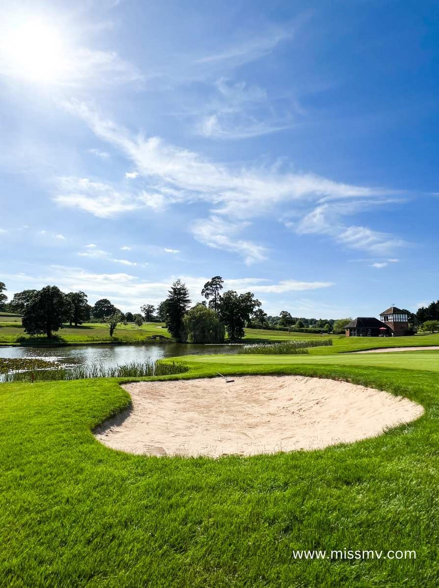 One of the golf holes near the lake at The Astbury Golf & Lodge Resort 