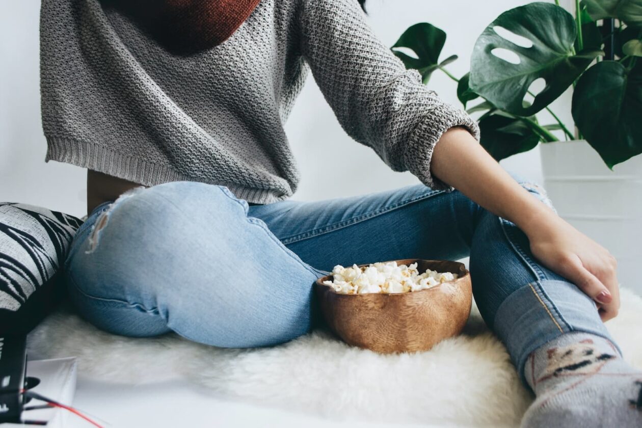 Woman near brown bowl with dish