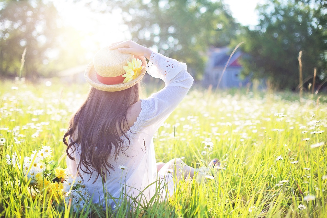 Woman, field, sunlight-aspects of life