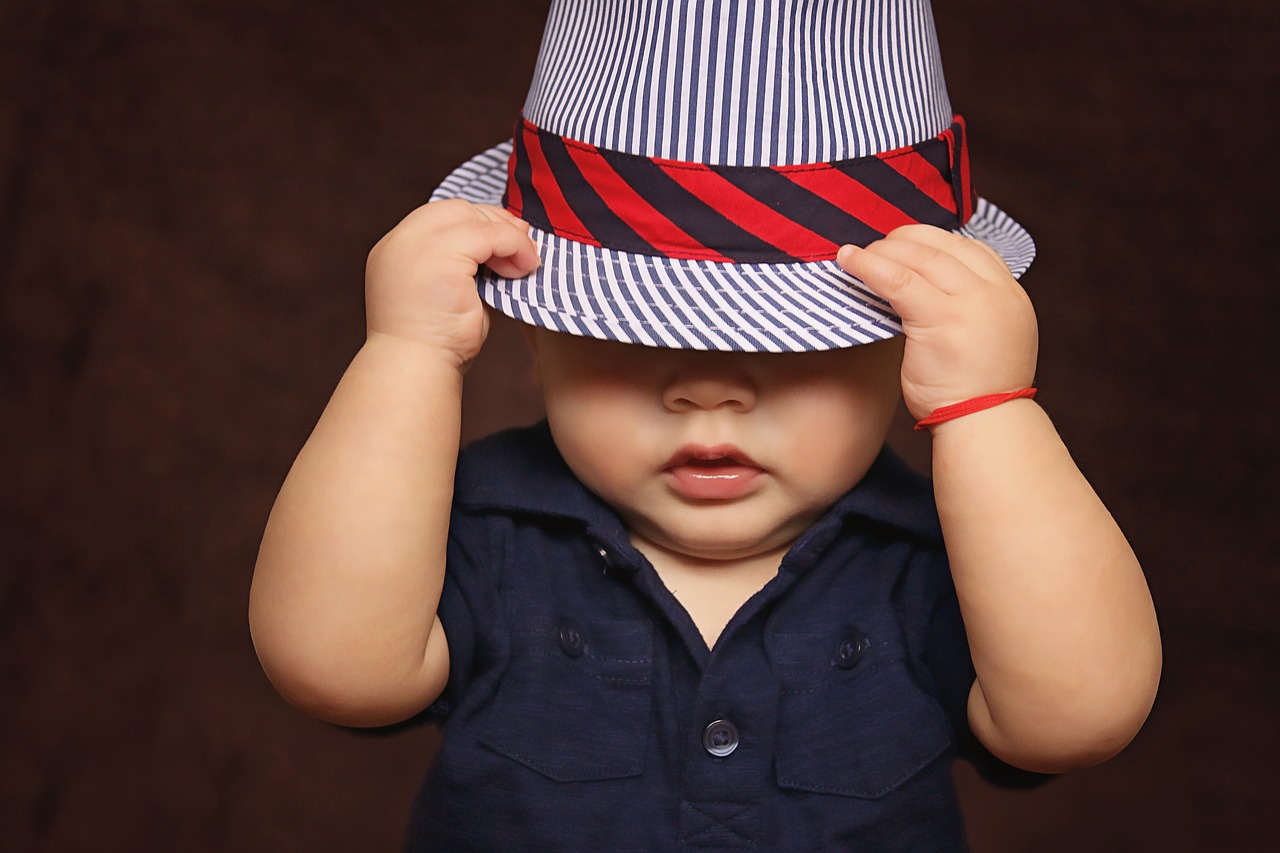 Baby, boy, hat-why does my toddler hit himself