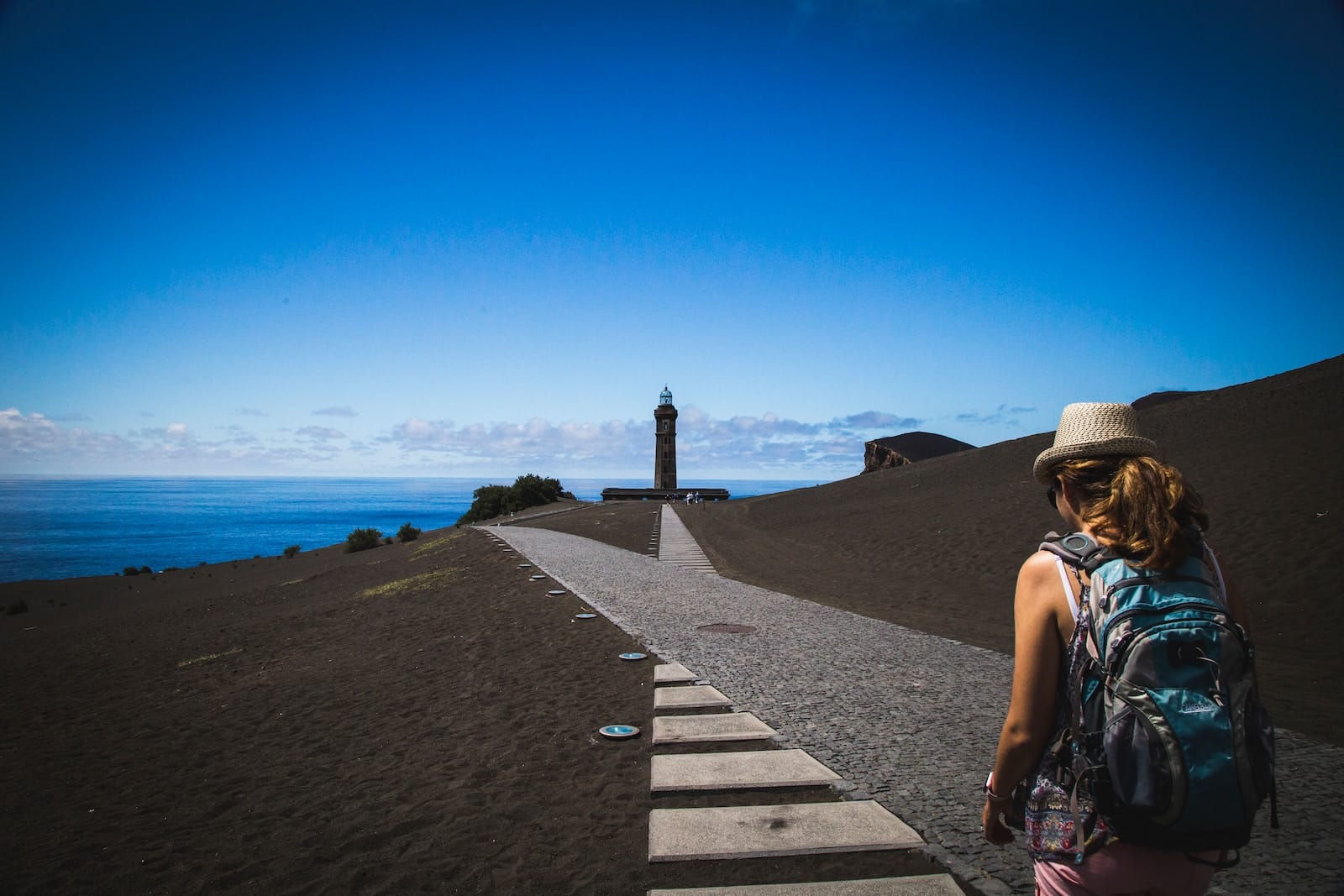Woman walking on road-setting realistic goals