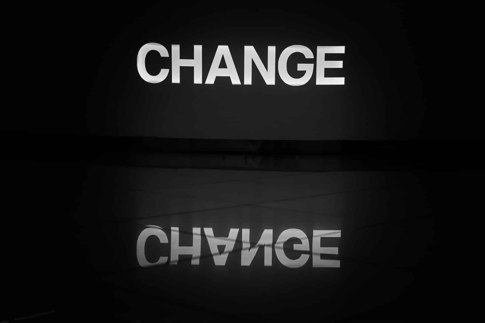 A black and white photo of the word change-motivation for change