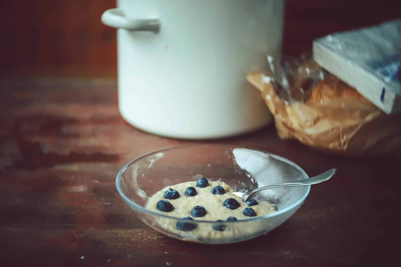 Brown and white pastry on clear glass bowl-quinoa porridge