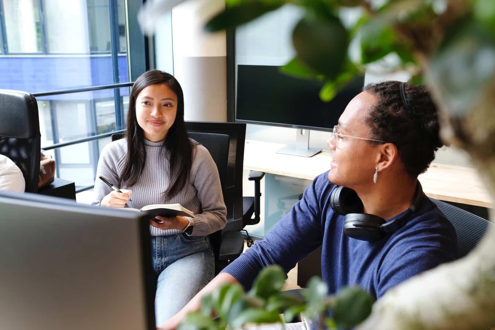 Man and woman sitting on chair-is it embarrassing to go back to your old job