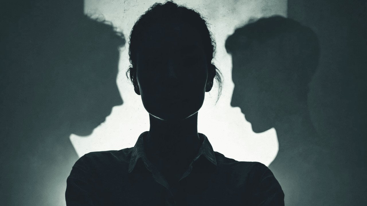 A person standing confidently with their arms cros-what happens when you ignore a gaslighter