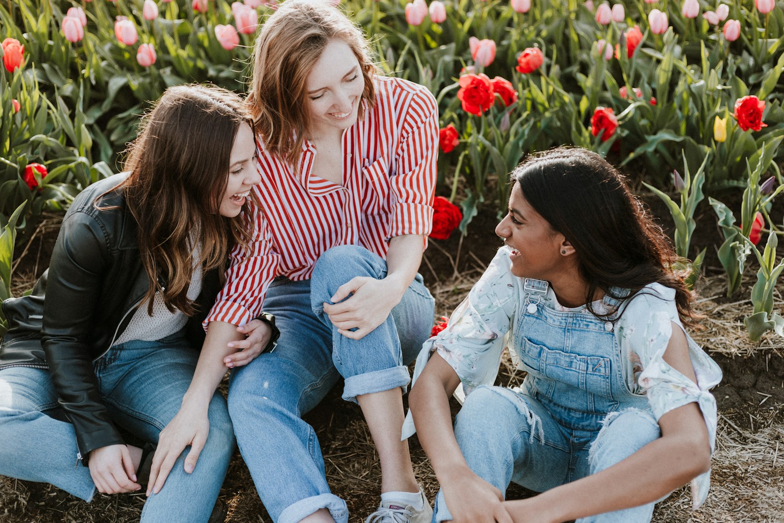 Three woman sitting near the flower-how to make someone feel seen