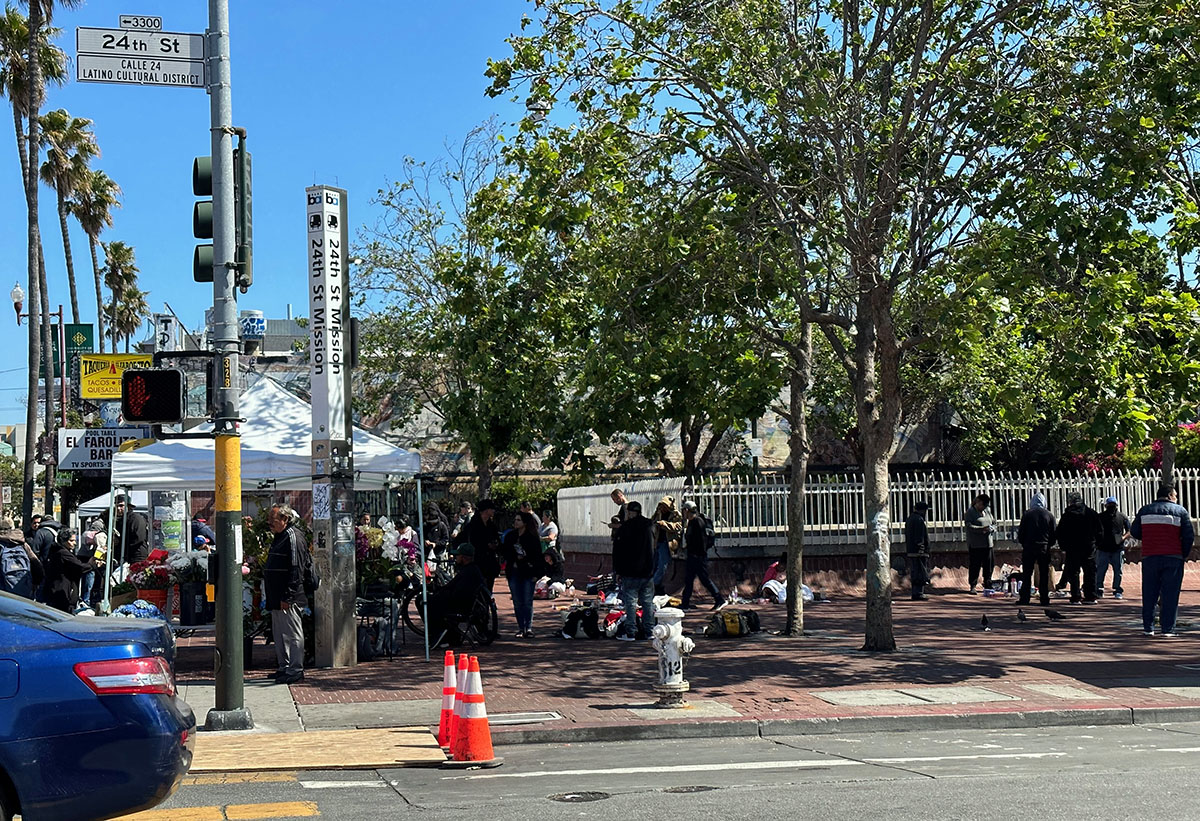 A plaza with vendors and buyers