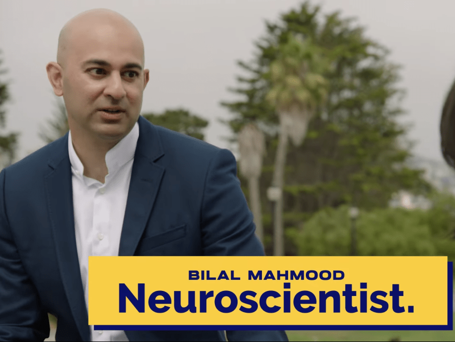 Bilal Mahmood in conversation, identified as a neuroscientist, with a subtitle across the image.