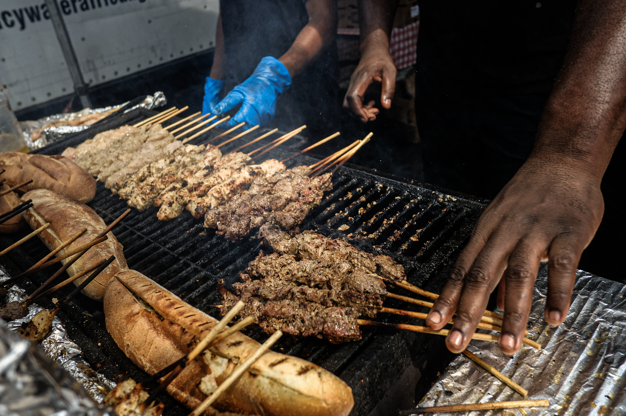Skewered meats on the grill at Spicy Water near Eastern Market in Washington, D.C.