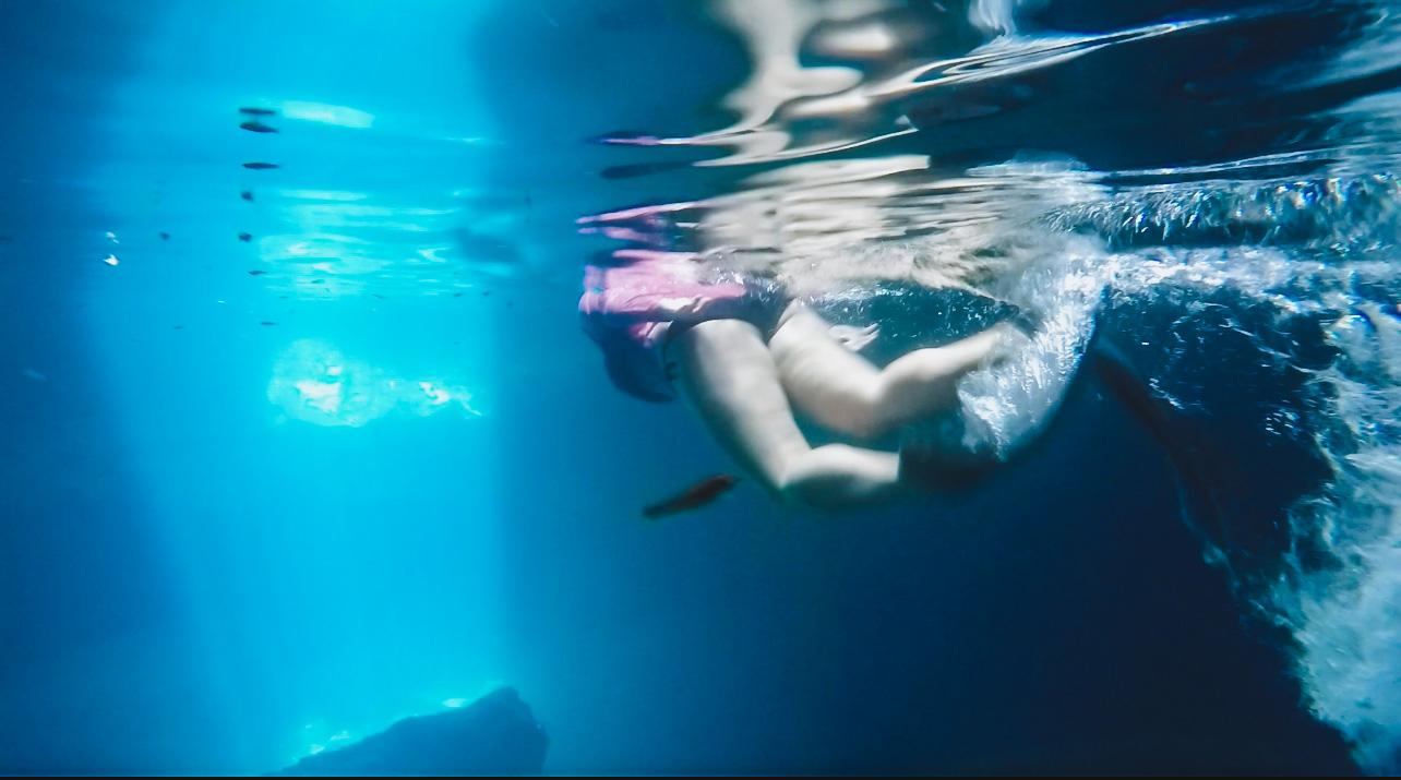 snorkeling in an underwater spring cave