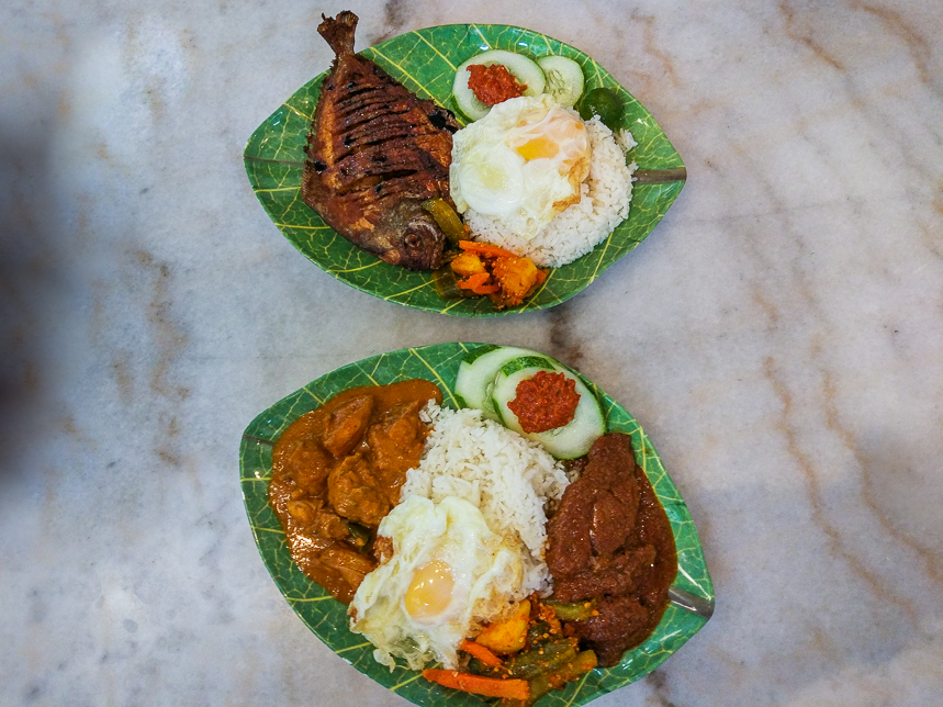 Beef Rendang Rice Set ($9.90) and a Crispy Pomfret Fish Rice Set ($13.90).