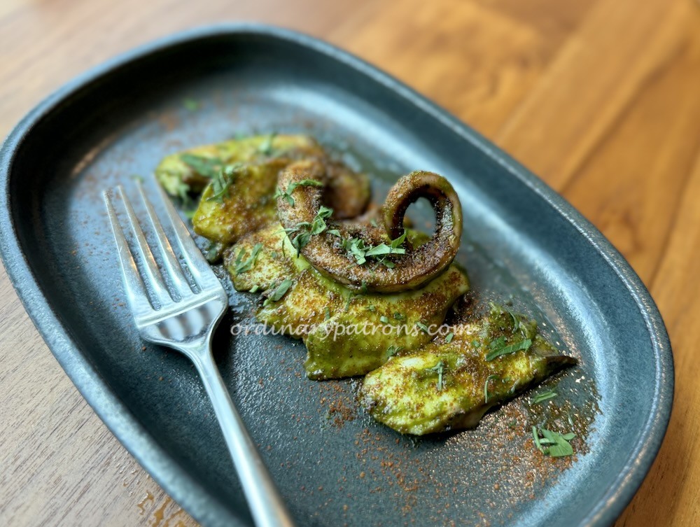 squid tentacle was coated with a pesto sauce 