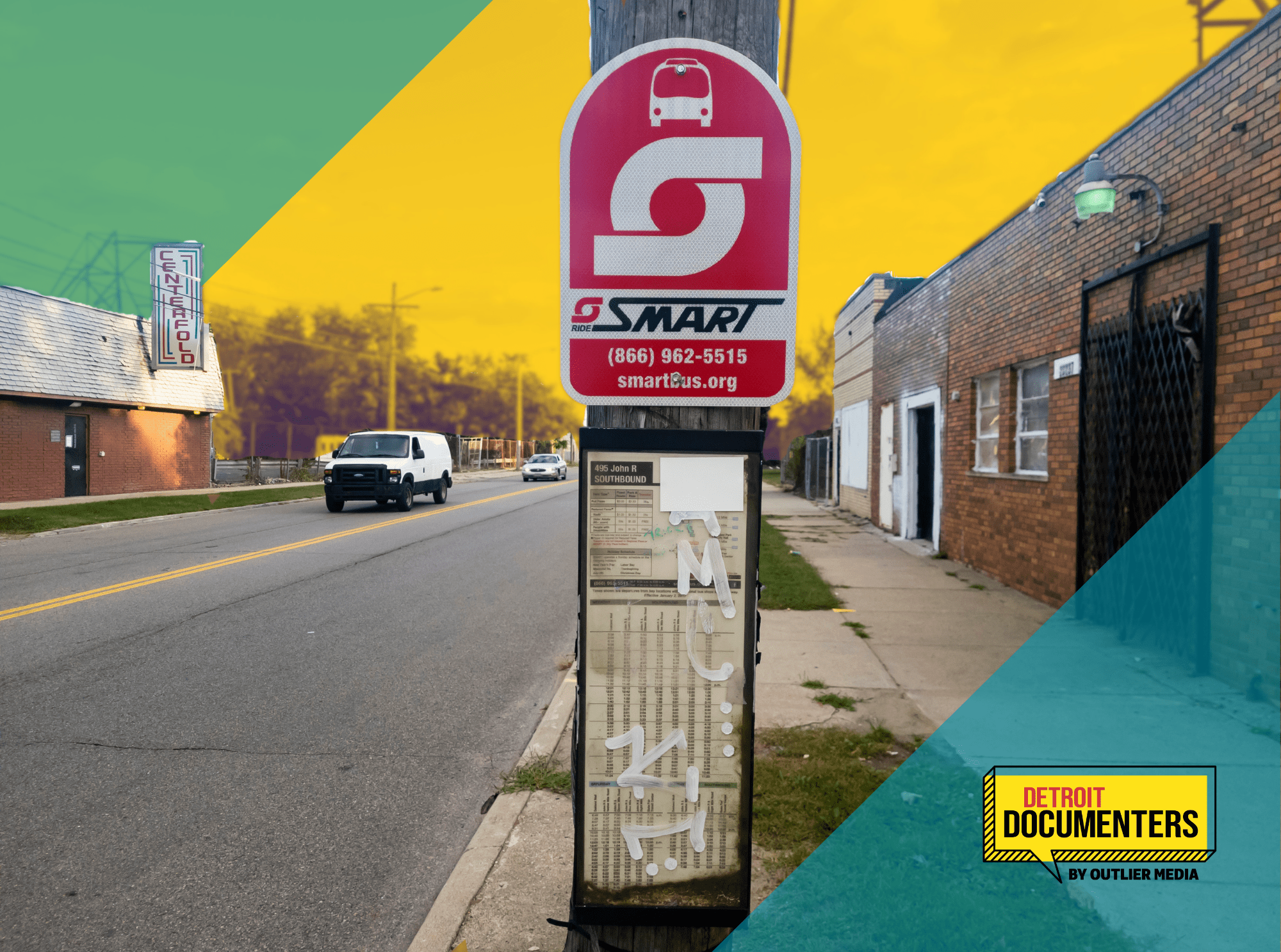 Pole with red-and-white bus stop sign for SMART with several dilapidated buildings behind.