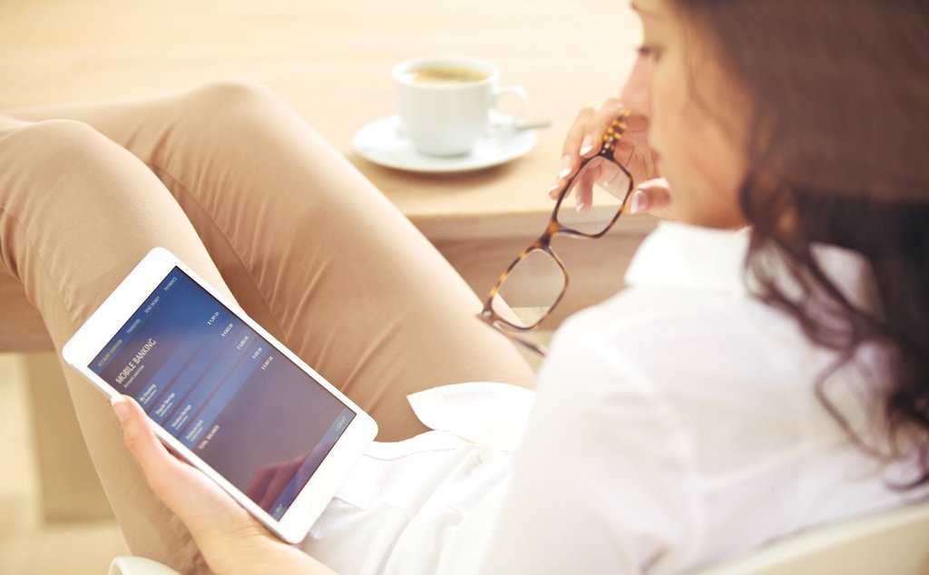 Young Corporate Woman Checking Her Bank Investment Online