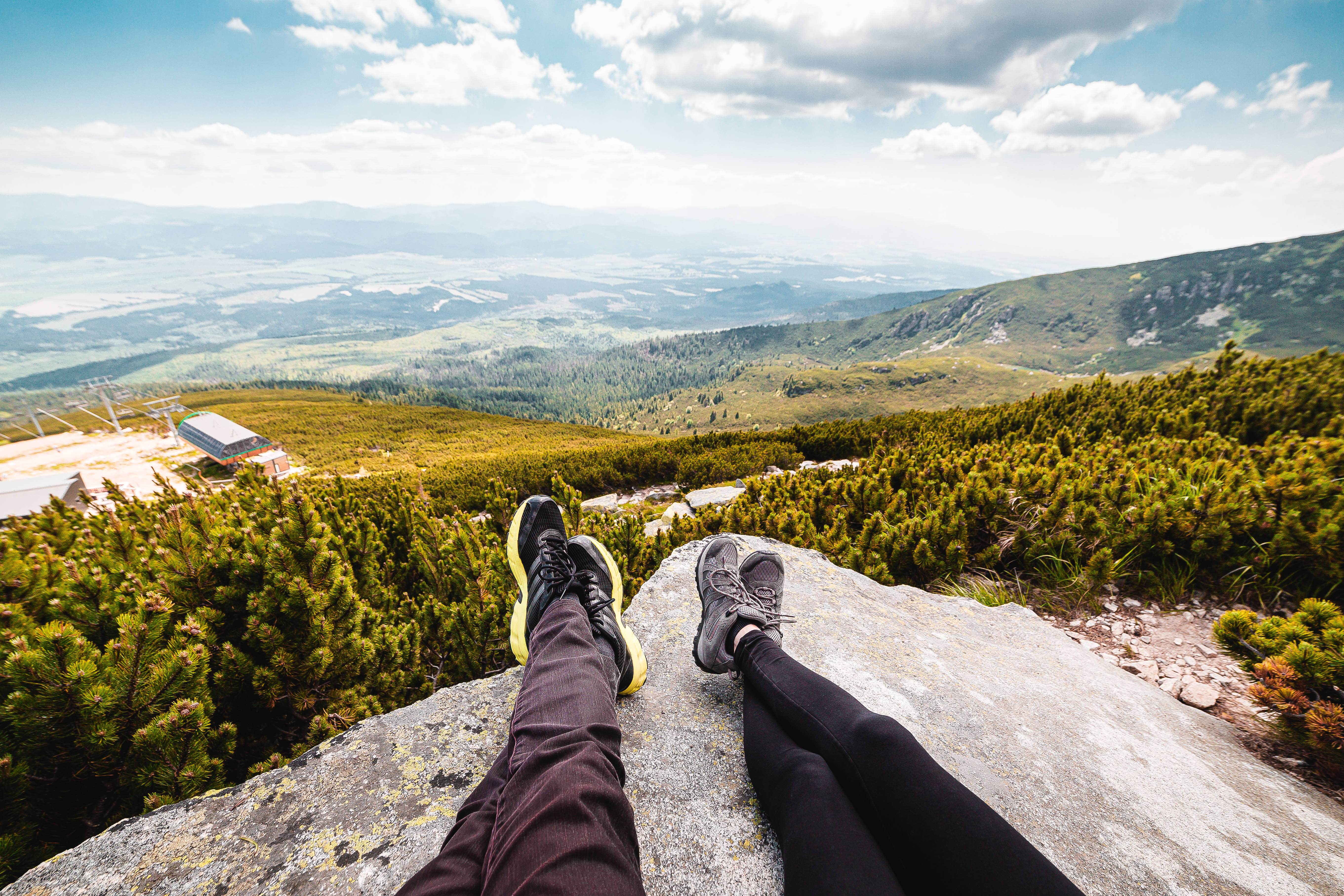 Couple Relaxing After Mountain Hiking Free Photo