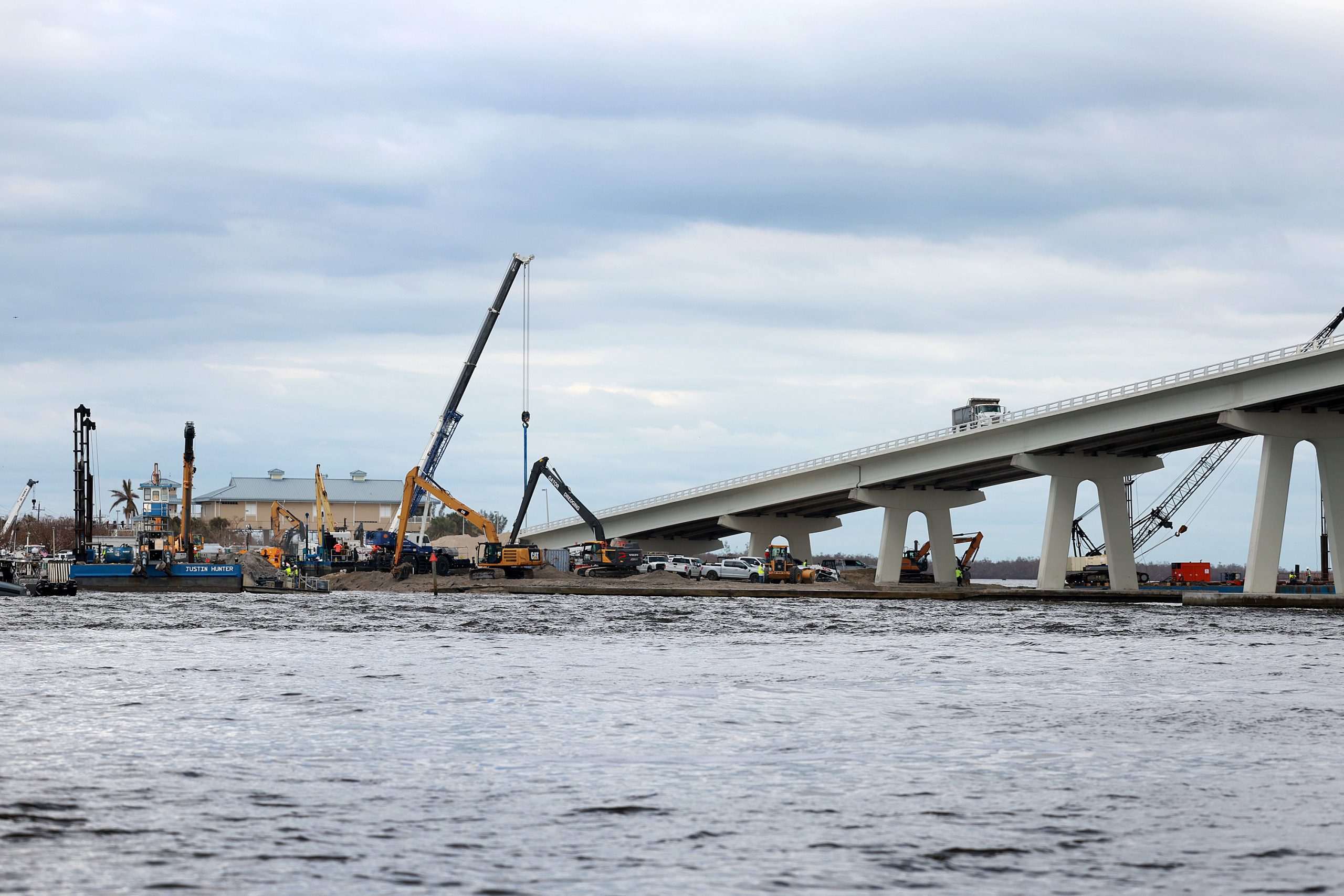 A view of cranes and construction machinery next to the Sanibel Causeway, which is being repaired.