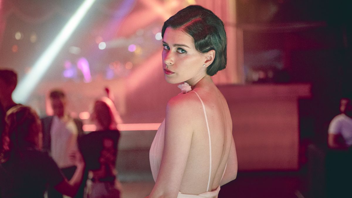 Anna-Maria Sieklucka as Laura, looking over her shoulder, in The Next 365 Days