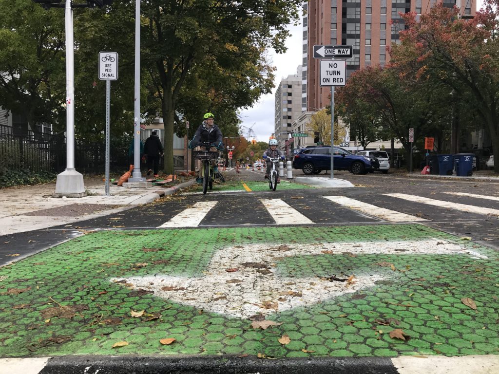 Sam and son biking on the new bikeway