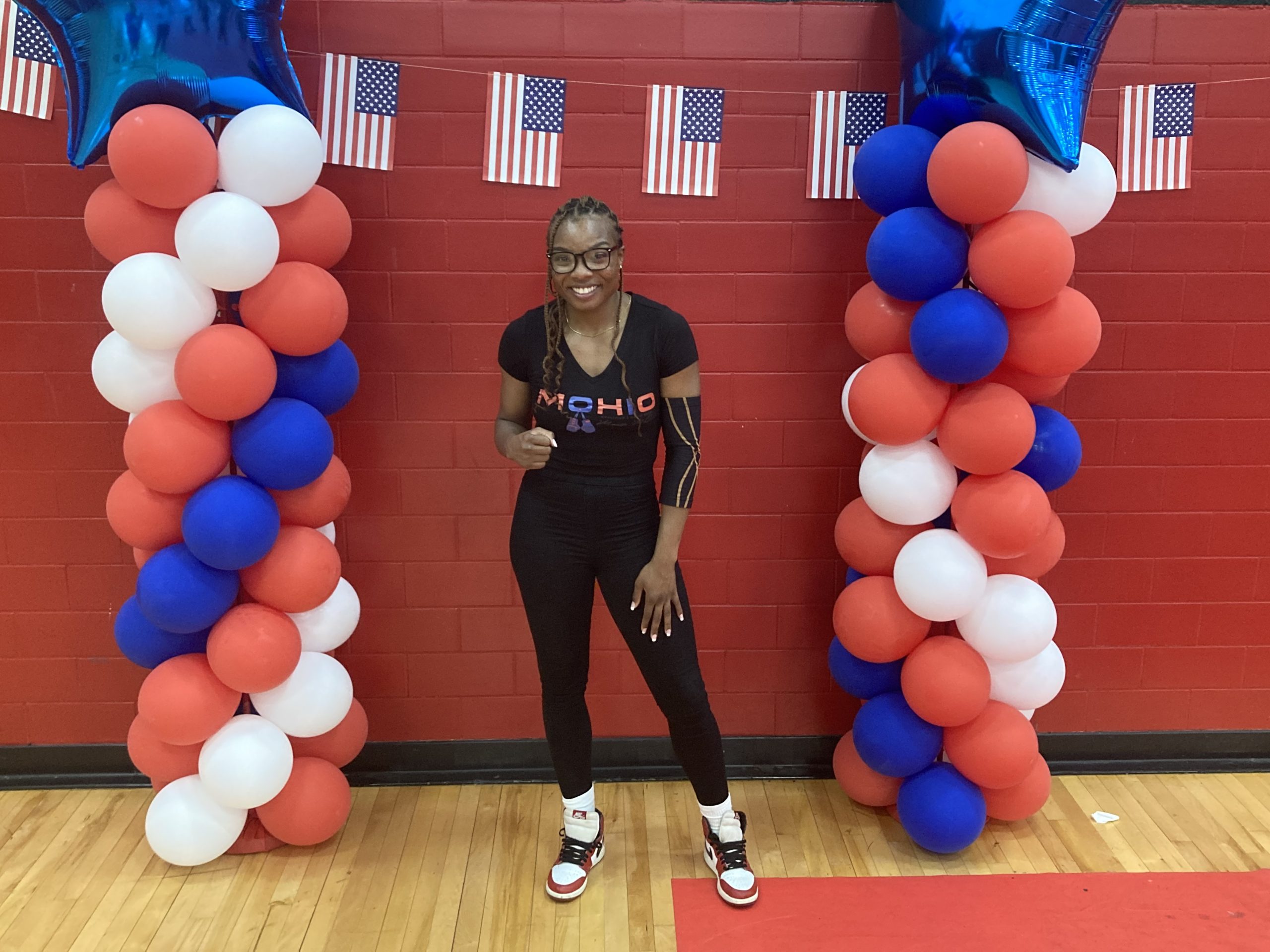 McCane poses in the gym of the Glenville Recreation Center.