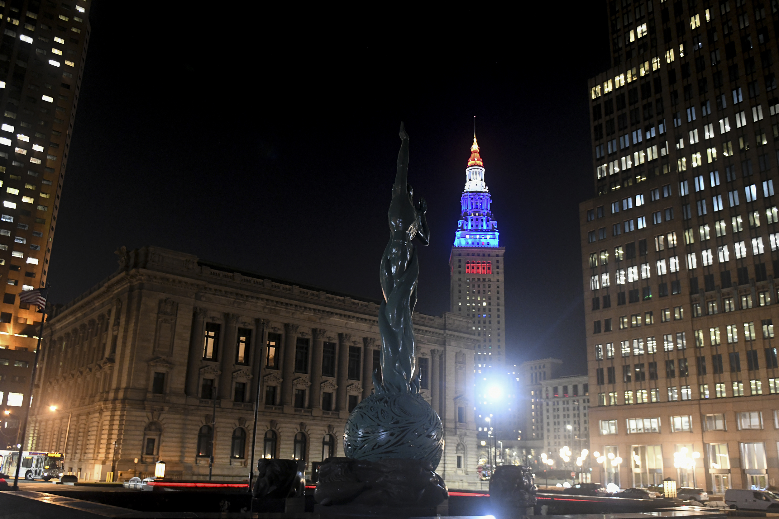 Terminal Tower, other downtown buildings at night.
