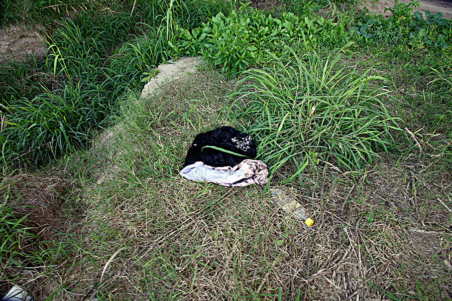 Susan Harbage Page, Clothes and bottle, Brownsville, Texas, 2010.