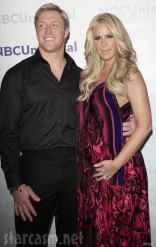 Kroy Biermann and Kim Zolciak together at red carpet event
