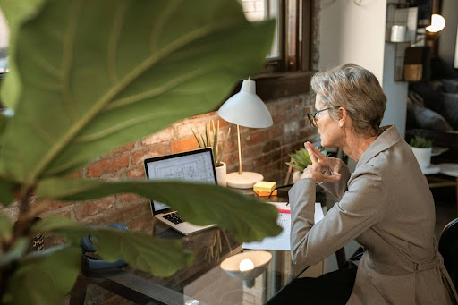 a woman learning how to optimize resume for AI