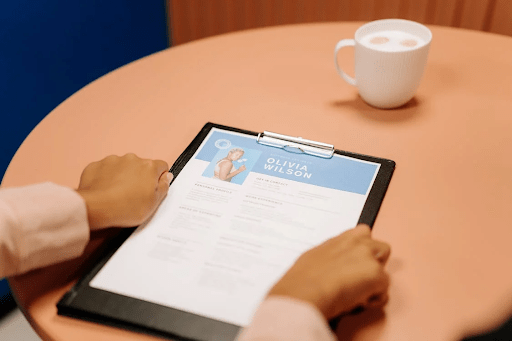 A person reviewing tailored resume for job description match