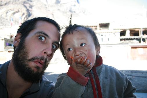 Kid eating big mitay Kid eating big mitay