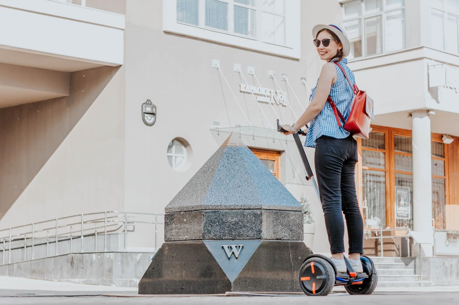 woman in a ride-on balancing board-segway tours