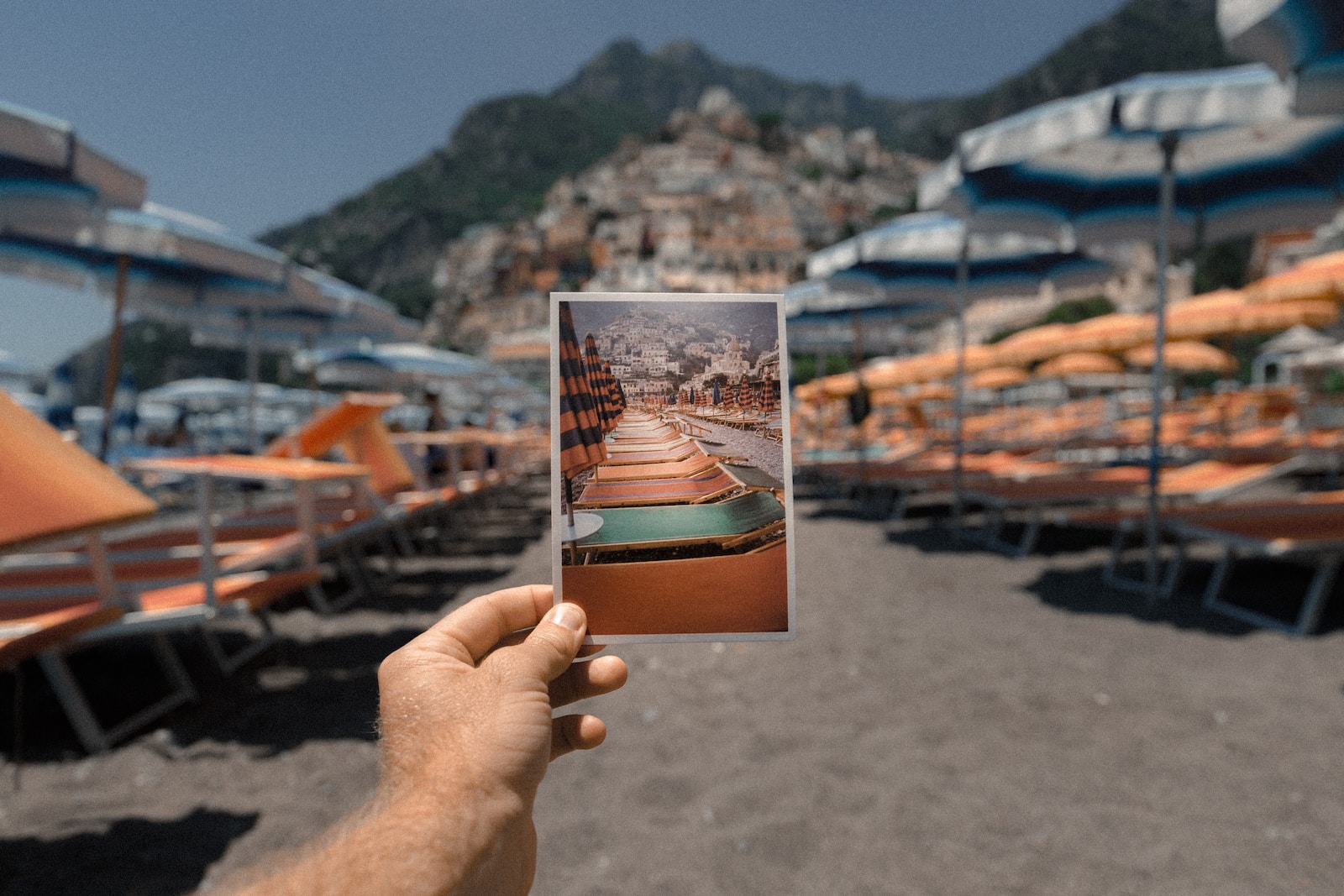 person holding outdoor lounge chairs photo-Storytelling Through Images