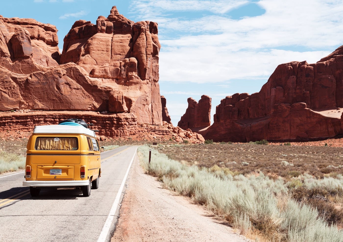 Arches National Park yellow Volkswagen van on road